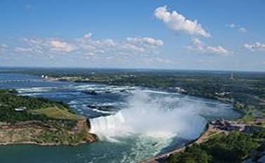 https://upload.wikimedia.org/wikipedia/commons/thumb/c/cd/Canadian_Horseshoe_Falls_with_Buffalo_in_background.jpg/220px-Canadian_Horseshoe_Falls_with_Buffalo_in_background.jpg
